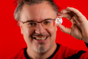 Mike Stirling, editorial director at Beano, unveils a new collectable 50p created by The Royal Mint in partnership with the comic to mark 75 years of Dennis the Menace, at Beano's Dundee headquarters. Photo: Euan Cherry/PA Media Assignments