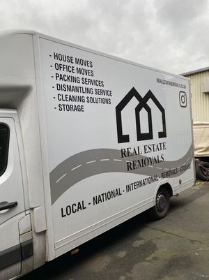 A van showing the logo of the removal company.