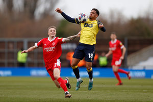 Carl Winchester of Shrewsbury Town and Marcus McGuane of Oxford United (AMA)