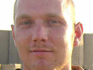 Supporting image for story: Tributes to hero soldier