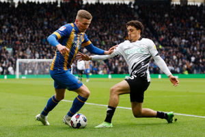 Taylor Moore of Shrewsbury Town and Hayden Roberts of Derby County (AMA)
