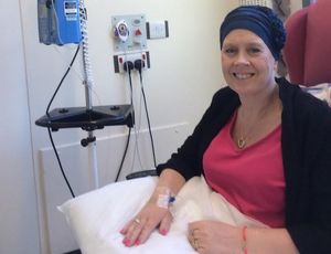 Julie receiving treatment for her illness.