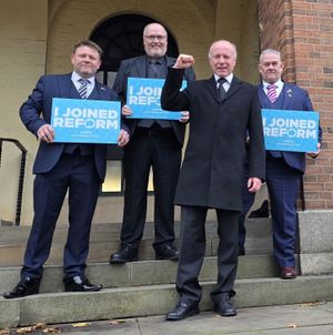 (l-r) Cllrs James Clinton and Shaun Keasey, Marco Longhi and Cllr Jason Thorne on the steps at Dudley Council House. Picture Reform UK free for LDRS use
