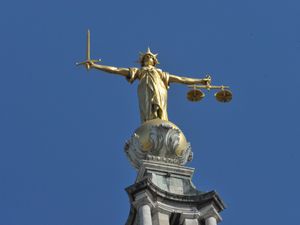 The Lady Justice statue on top of the Old Bailey