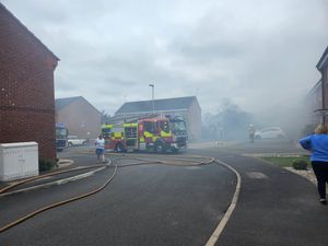 Fire crews at the scene of the blaze in Wharf Mews, Netherton. Photo: Ria Butcher