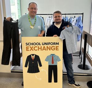 Cllr Matt Cook (right) with Brierley Hill library manager \'Rocco\' launching a new school uniform exchange. Picture Cllr Matt Cook free for LDRS use