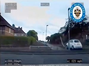 The Fiat 500 was driven through wooden barriers 