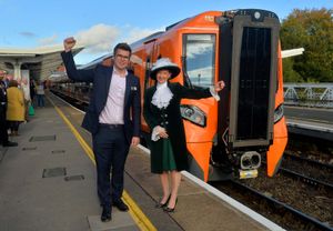 Jonny Wiseman, customer experience director at West Midlands Trains, with High Sheriff of Shropshire Selina Graham and the new train