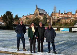 Julia with club members at her visit to the bowling Club
