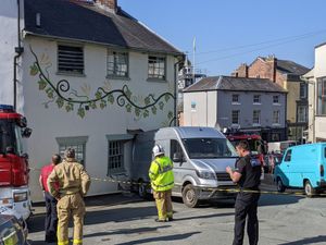 Supporting image for story: Van crashes into Bishop's Castle building leaving it wedged in wall