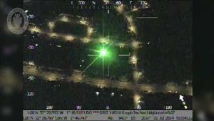The laser is shone into the police helicopter