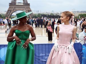 Ariana Grande and Cynthia Erivo in front of the Eiffel Tower