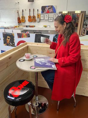 A customer enjoys the coffee station at Retro Records, inside The Retro Station in Leominster. 
