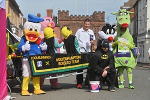 Pictured is: Donald Duck ( Neil Hendy, Mr Blobby (Rich Banks), Wolves Bob team: Andy Newman, Batman: Steve Wilkins, Sylvester the Cat: Steve Spencer and Dana Power in his Dragon suit.