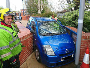 Supporting image for story: Oops! It's a tight squeeze for this driver