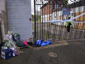 Supporting image for story: Tribute paid to boy who died in fire as 14 children arrested