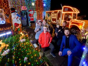 Supporting image for story: Telford family puts up epic Christmas lights display with Santa's sleigh and Coca-Cola truck
