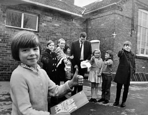 Hodnet County Primary School, December 1970: 'Mr Arthur Barnett, the headmaster, seen with pupils after he received a postal order for the cost of the transport.' The accompanying story told how, earlier in the month, a party of the schoolchildren had to sit three hours in the darkness of a Crewe theatre waiting to see a performance of The Owl and the Pussycat because of a power cut brought about by a work to rule by electricity workers. The performance was cancelled but they were given free tickets for another, and turned up for that but still had to pay for the coach. The headmaster, Mr A Barnett, wrote to the Midlands Electricity Board claiming £6 10s for the coach. MEB employees had a whip round and sent the money for the coach. 