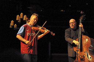 Nigel Kennedy struts his stuff at Birmingham Symphony Hall in the shirt of his beloved Villa