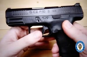 A semi-automatic pistol was found at the house