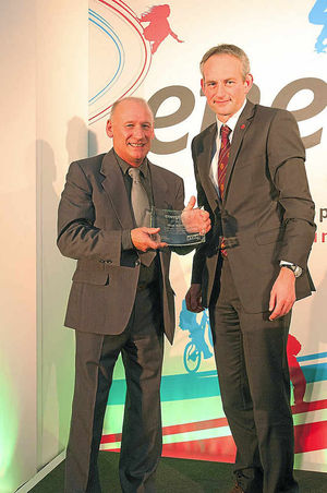 Alan Ashfield is handed the William Penny Brookes trophy for his outstanding contribution to the Shropshire sporting scene by Simon MacVicker