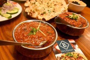 The lamb curry and chicken claypot behind it