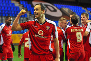Ben Purkiss of Walsall celebrates after the victory at Tranmere in the Northern area semi-finals.