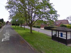 Supporting image for story: Casualty helped by paramedics after a car hits tree near Shifnal