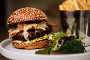 BORDER COPYRIGHT SHROPSHIRE STAR JAMIE RICKETTS 04/03/2022 - Food Review for The Weekend - The Cross Keys, Kinnerley. In Picture: Bacon Cheese Burger.