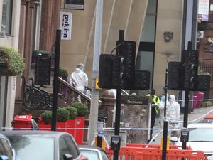 Supporting image for story: Smoke grenade mistakenly used by police at hotel stabbings scene, inquiry told