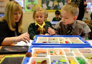 Pupils at Birchfield School use lego to help with their maths.