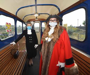 Dean Harris, the High Sheriff of Shropshire and the Mayor of Bridgnorth Councillor Kirstie Hurst-Knight looking at various areas of the Cliff Railway top station