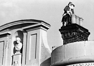 Derek 'Poddy' Podmore scaling the walls of Shrewsbury Prison with presents for the prisoners