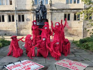 Supporting image for story: Shropshire's Red Rebels join scarlet-clad political performers for Cop26