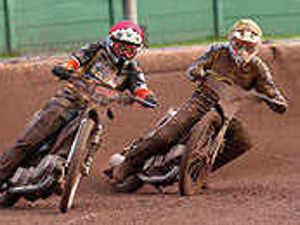 Supporting image for story: Wolves brave the elements to win