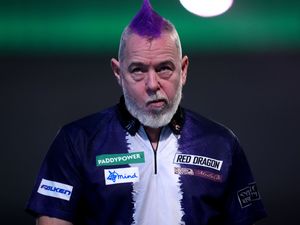 Supporting image for story: Peter Wright crashes out in round two after predicting he would win title