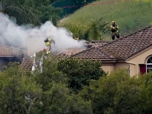 Supporting image for story: Two people die as small plane crashes into California neighbourhood