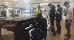 The teenager with his friends performing in Merry Hill