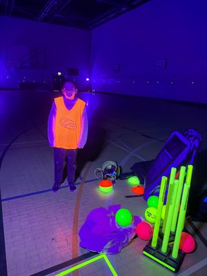 Mahnoor Qayyum with Glow cricket equipment