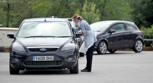 People queue up to be tested at a walk-through testing centre in Stone, after an outbreak at a local pub