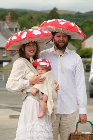 Holly Blackshaw-Hay and Toby Hay with five and  a half month old Marta dressed as mushrooms