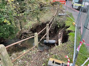 Supporting image for story: Main road to remain closed while collapsed embankment is repaired