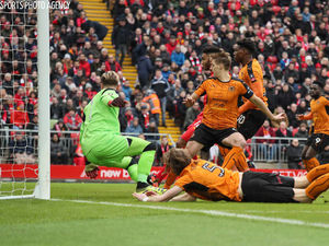 Supporting image for story: FA Cup: Watch behind the scenes footage from Wolves' memorable trip to Anfield