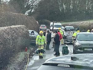 Supporting image for story: Crash 'caused by ice' leaves one car on its roof and another in a hedge