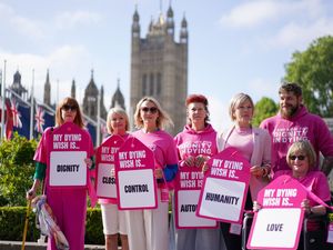 Campaigners demonstrating on assisted dying outside Parliament