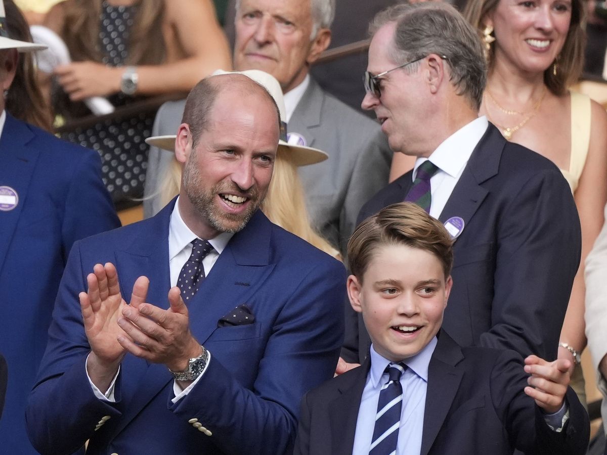 William and George don aprons to help with Christmas lunch at homeless shelter