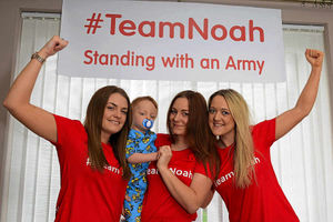 Centre, Jodie Hole holding Noah, with with friends Hannah Howells, left and Beckey Owens