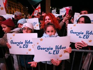 Supporting image for story: Georgians vote in make-or-break election for country’s future