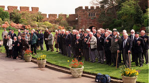 War veterans and guests watch the handing over of the HMS Shropshire crest at Shrewsbury Castle in April 1999.
