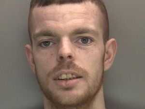 Supporting image for story: Man, 25, wanted by police after Brierley Hill robbery